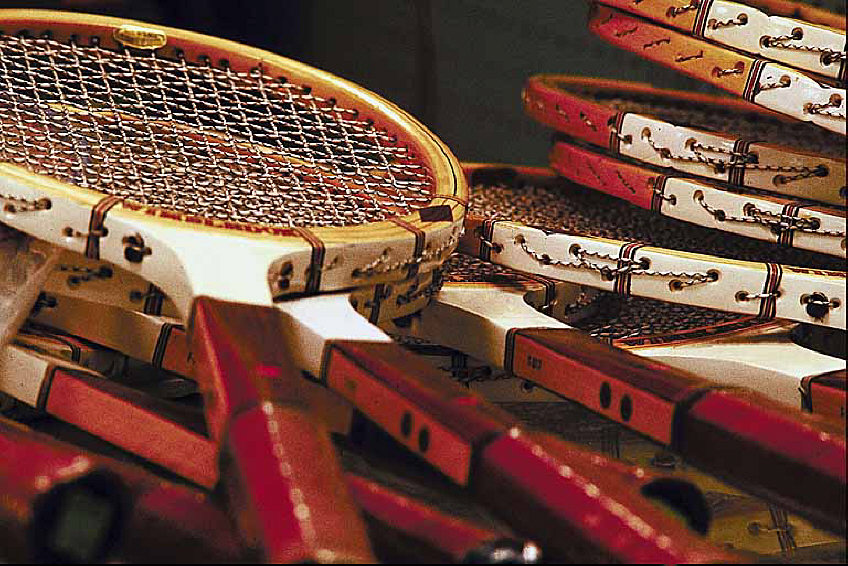 tennis rackets in stacks